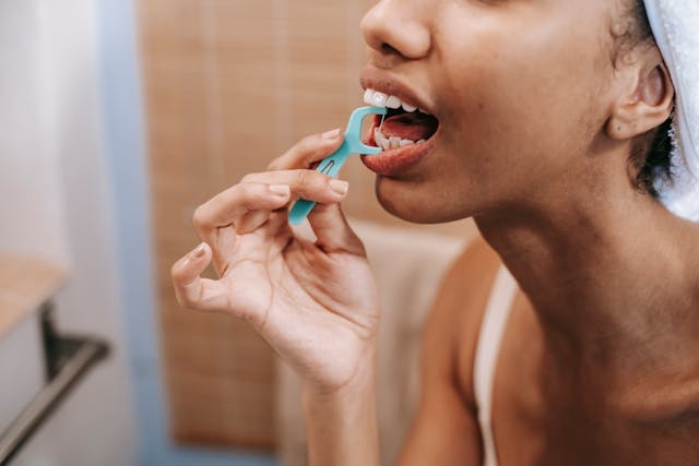 types of floss erson using a floww threader